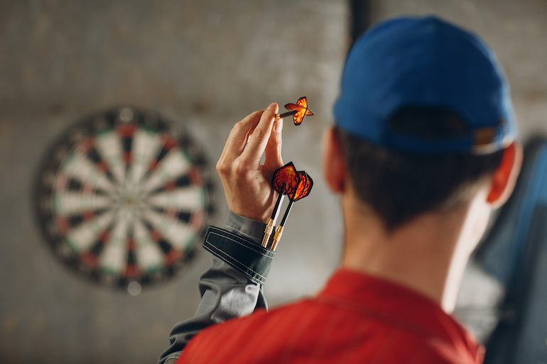 Darts game. Dart and target.