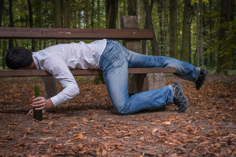 drunk man on park bench