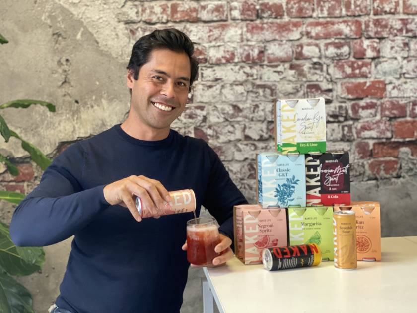 Naked Life founder David Andrews pouring a beverage